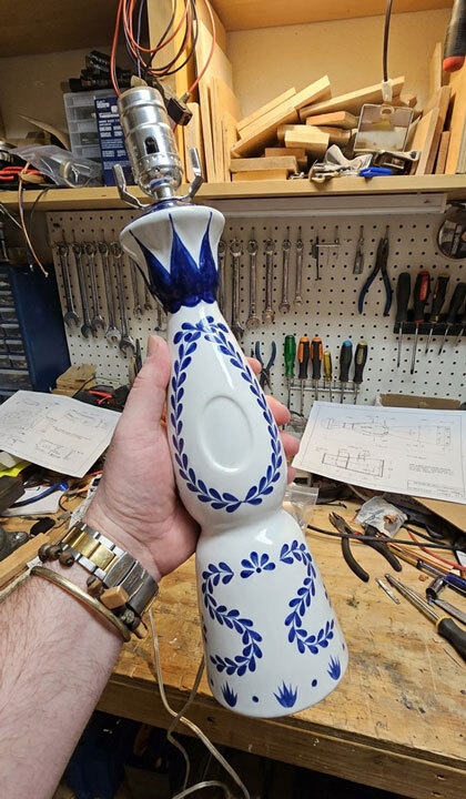 Rebuilding a Clase Azul bottle into a lamp in the studio